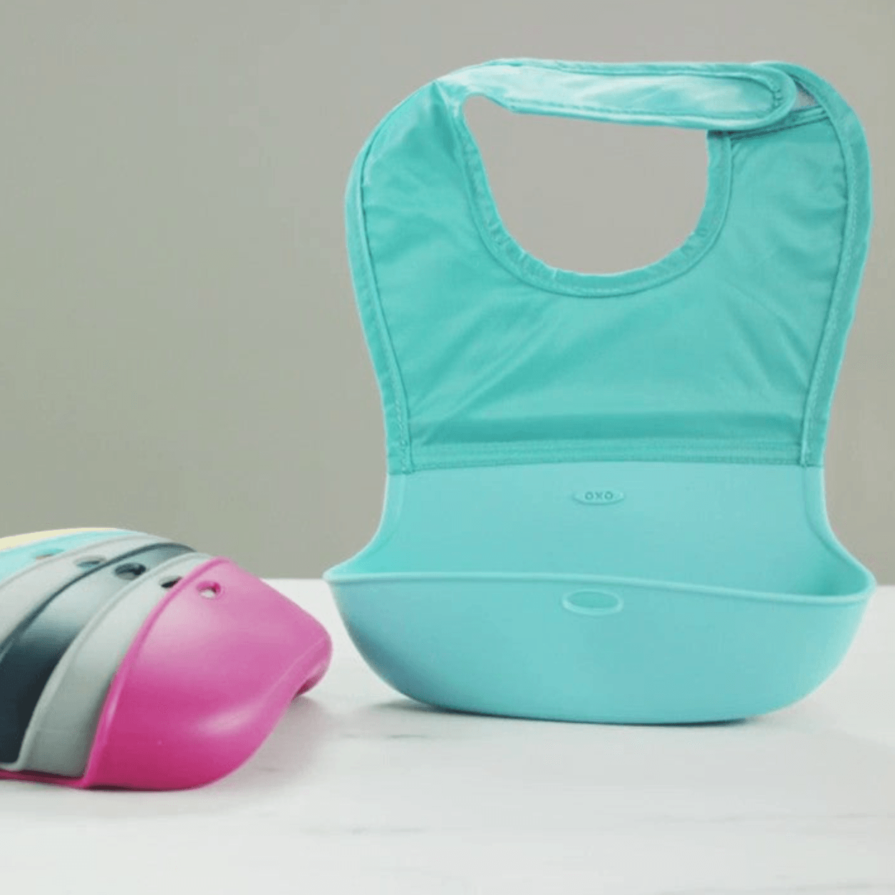 Oxo Tot Roll-up Bib | The Nest Attachment Parenting Hub