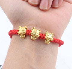 Nest Freebies: 3 Dragons Red Rope Bracelet | The Nest Attachment Parenting Hub