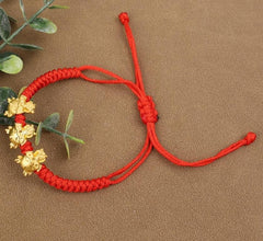 Nest Freebies: 3 Dragons Red Rope Bracelet | The Nest Attachment Parenting Hub