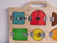 QToys Lock Activity Board 561 | The Nest Attachment Parenting Hub