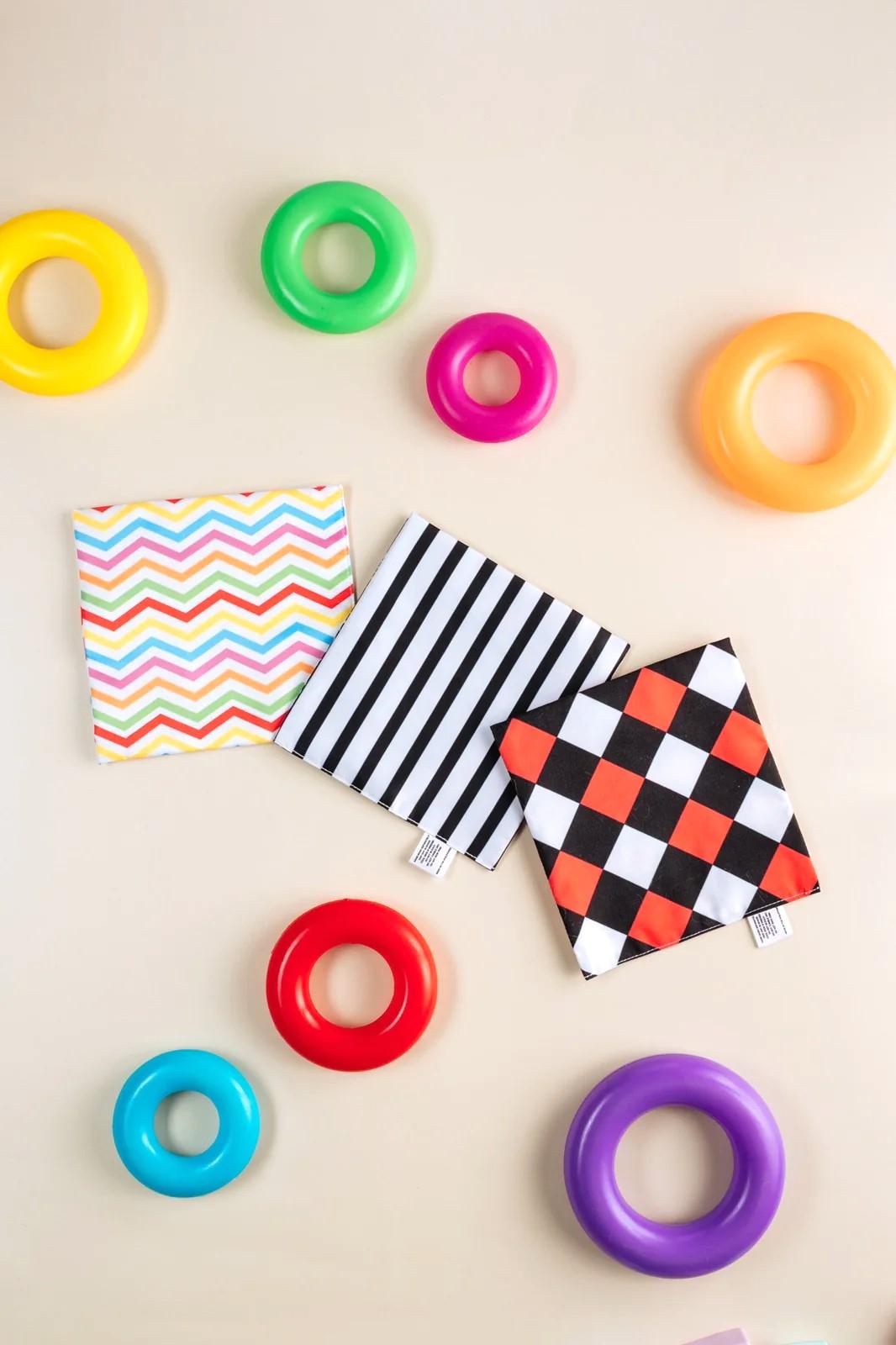 Infantway Huggabooks 3-in-1 Virtual Training and Sensory Cloth Toy | The Nest Attachment Parenting Hub