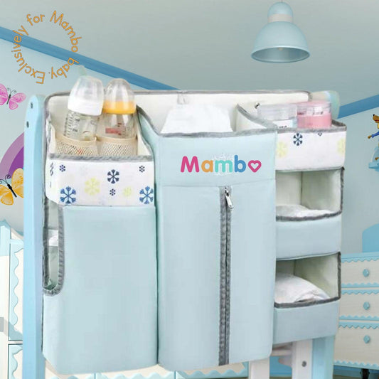 https://thenestaph.com/cdn/shop/files/mambobabyph-crib-hanging-organizer-portable-diaper-caddy-storage-the-nest-attachment-parenting-hub-1_533x.jpg?v=1703860037