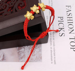 Nest Freebies: 3 Dragons Red Rope Bracelet | The Nest Attachment Parenting Hub