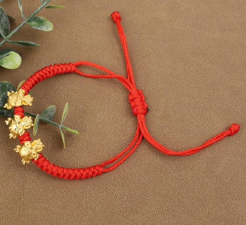 Nest Freebies: 3 Dragons Red Rope Bracelet | The Nest Attachment Parenting Hub