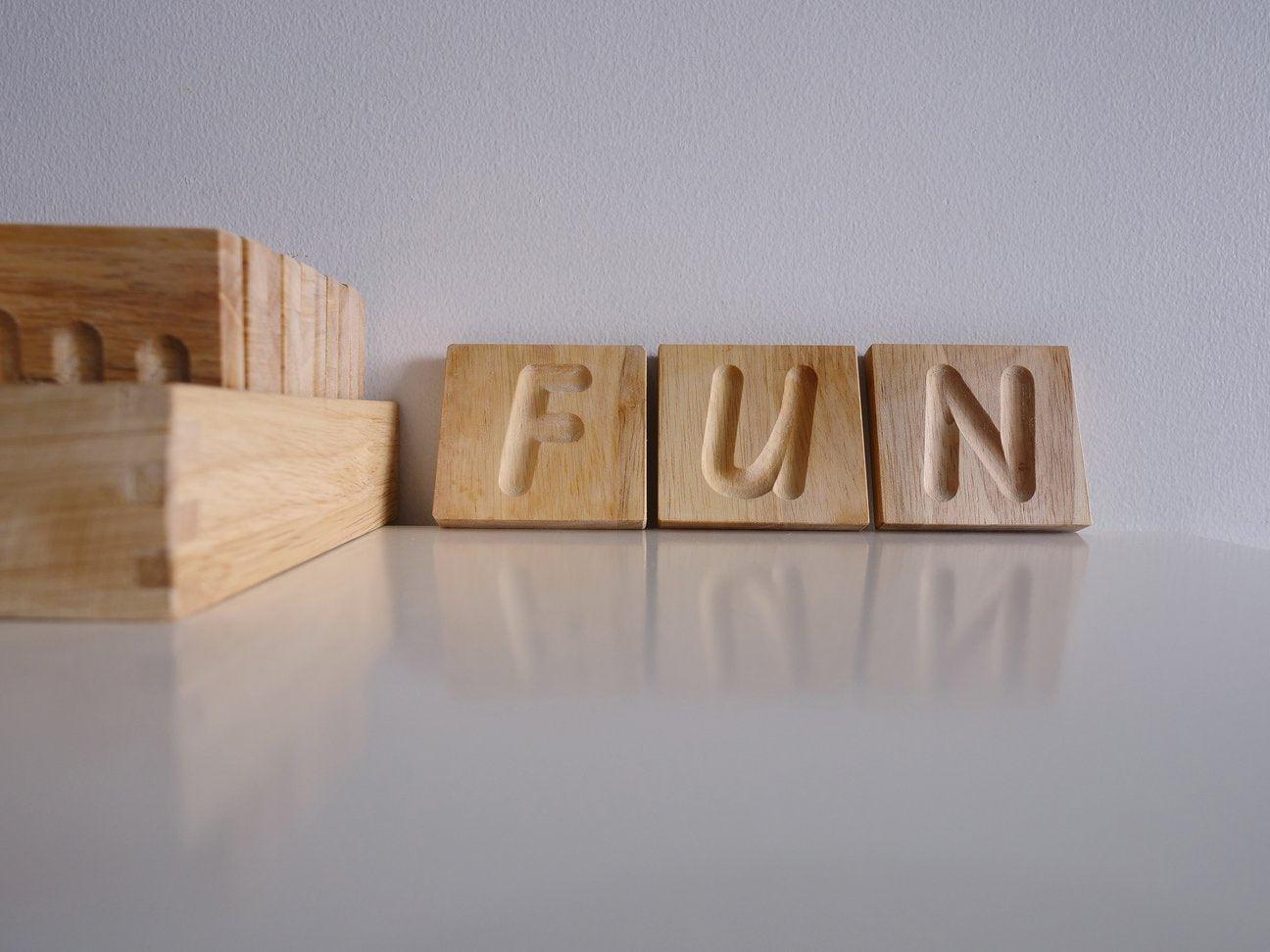 QToys Capital Letters Spelling Tiles 487 | The Nest Attachment Parenting Hub