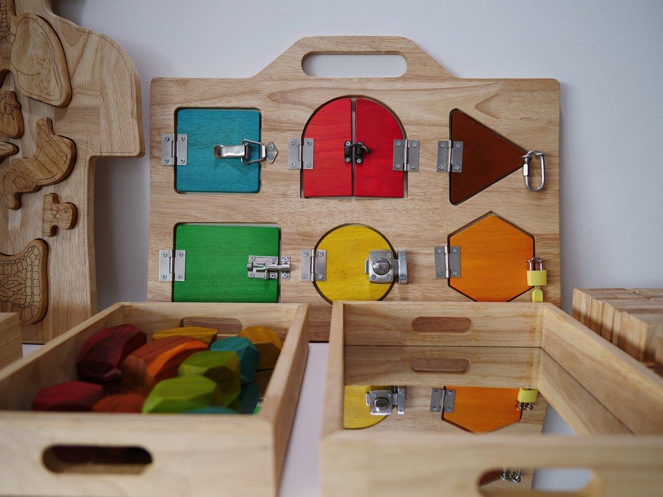 QToys Lock Activity Board 561 | The Nest Attachment Parenting Hub