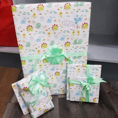 The Nest APH Dino Gift Wrap | The Nest Attachment Parenting Hub