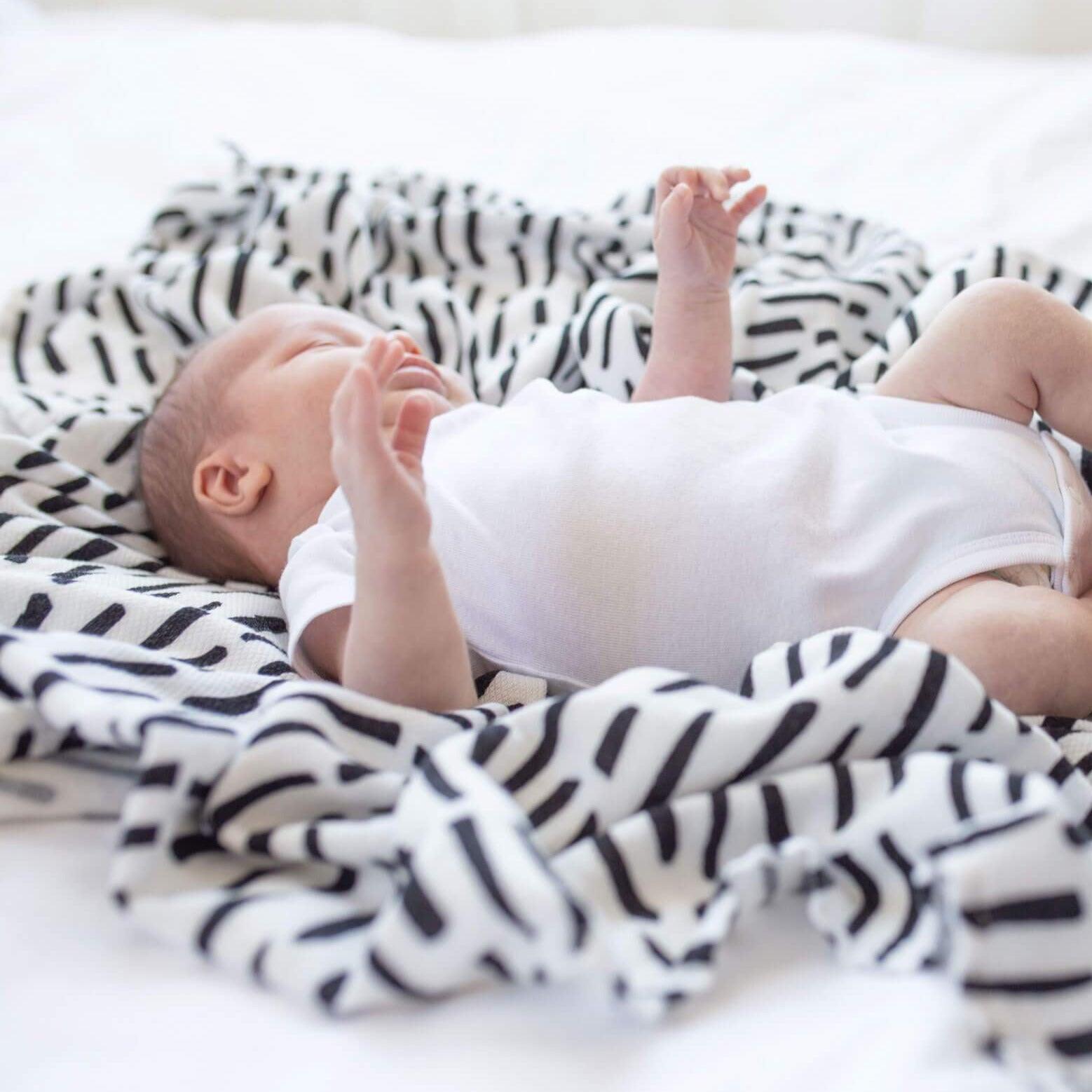 Tiny Twinkle Swaddle Blanket | The Nest Attachment Parenting Hub